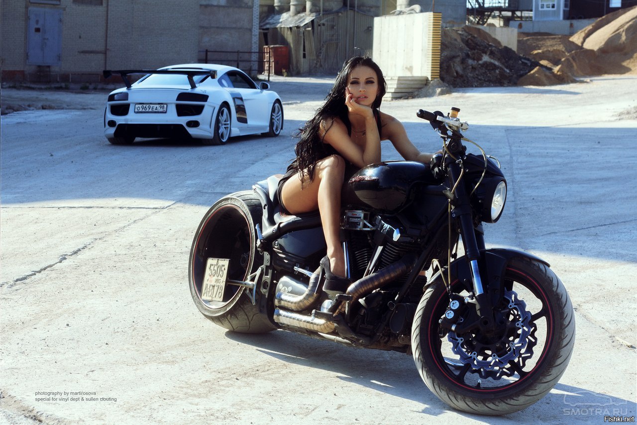 Sexy model Brunettes on a motorcycle in Odessa